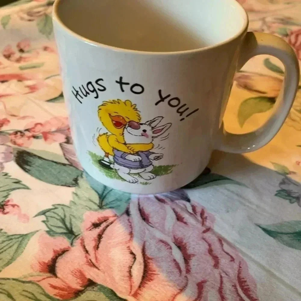 Duck Huging a Bunny Coffee Meg